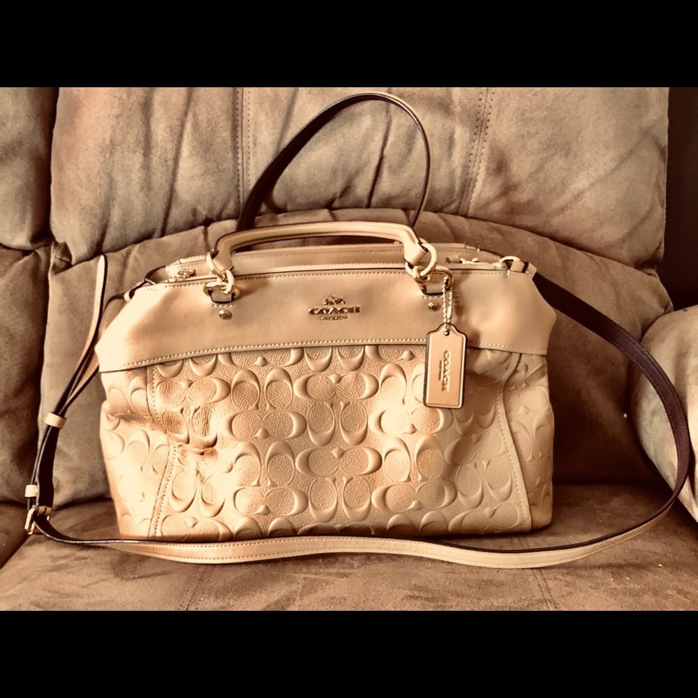 COACH and in a pristine condition. Very minimal used.